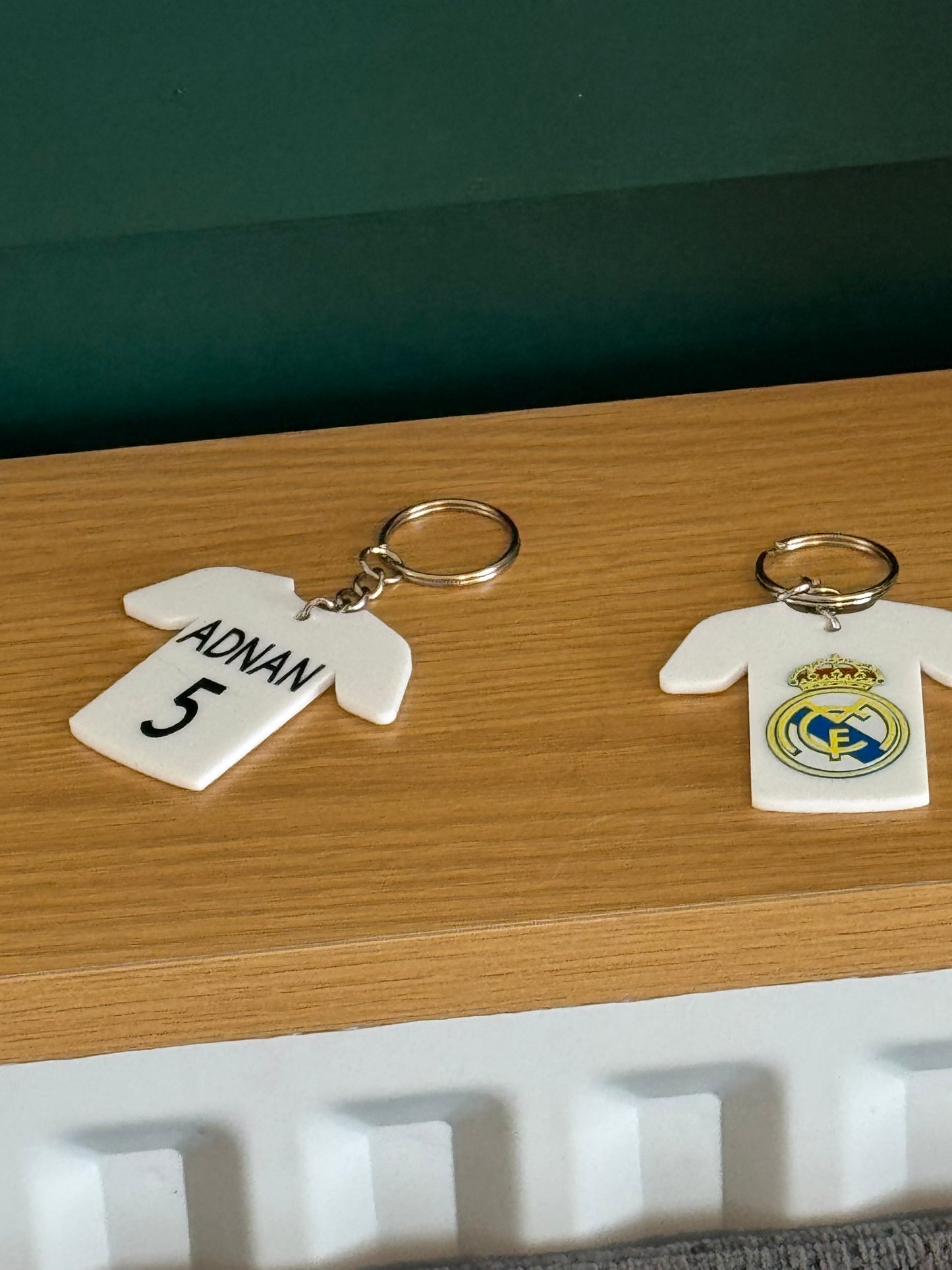 White acrylic Madrid theme keychain