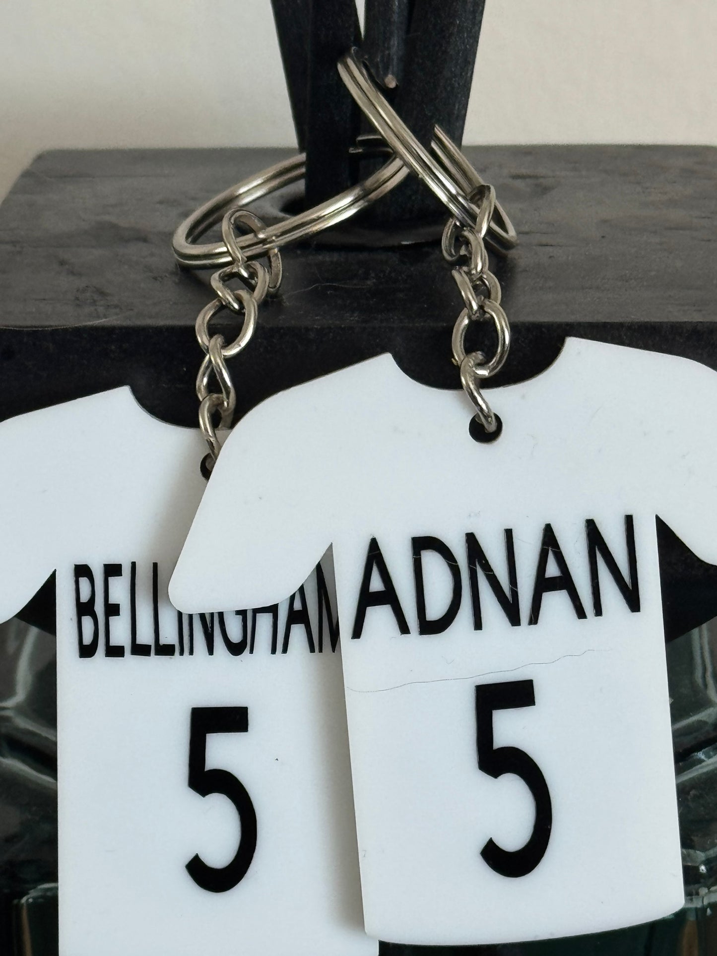 White acrylic Madrid theme keychain