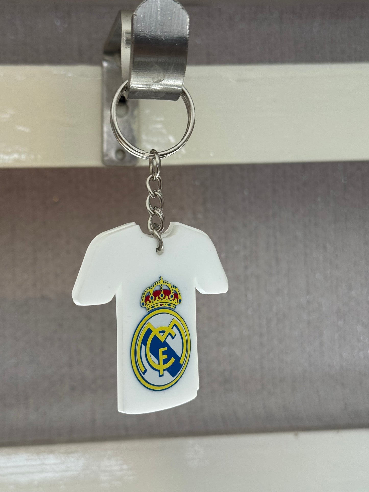 White acrylic Madrid theme keychain